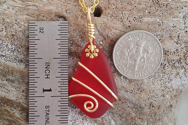 Handmade in Hawaii, gold wire wrapped Ruby Red sea glass necklace,"July Birthstone".