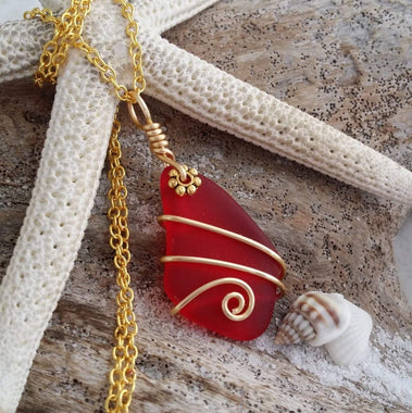 Handmade in Hawaii, gold wire wrapped Ruby Red sea glass necklace,"July Birthstone".